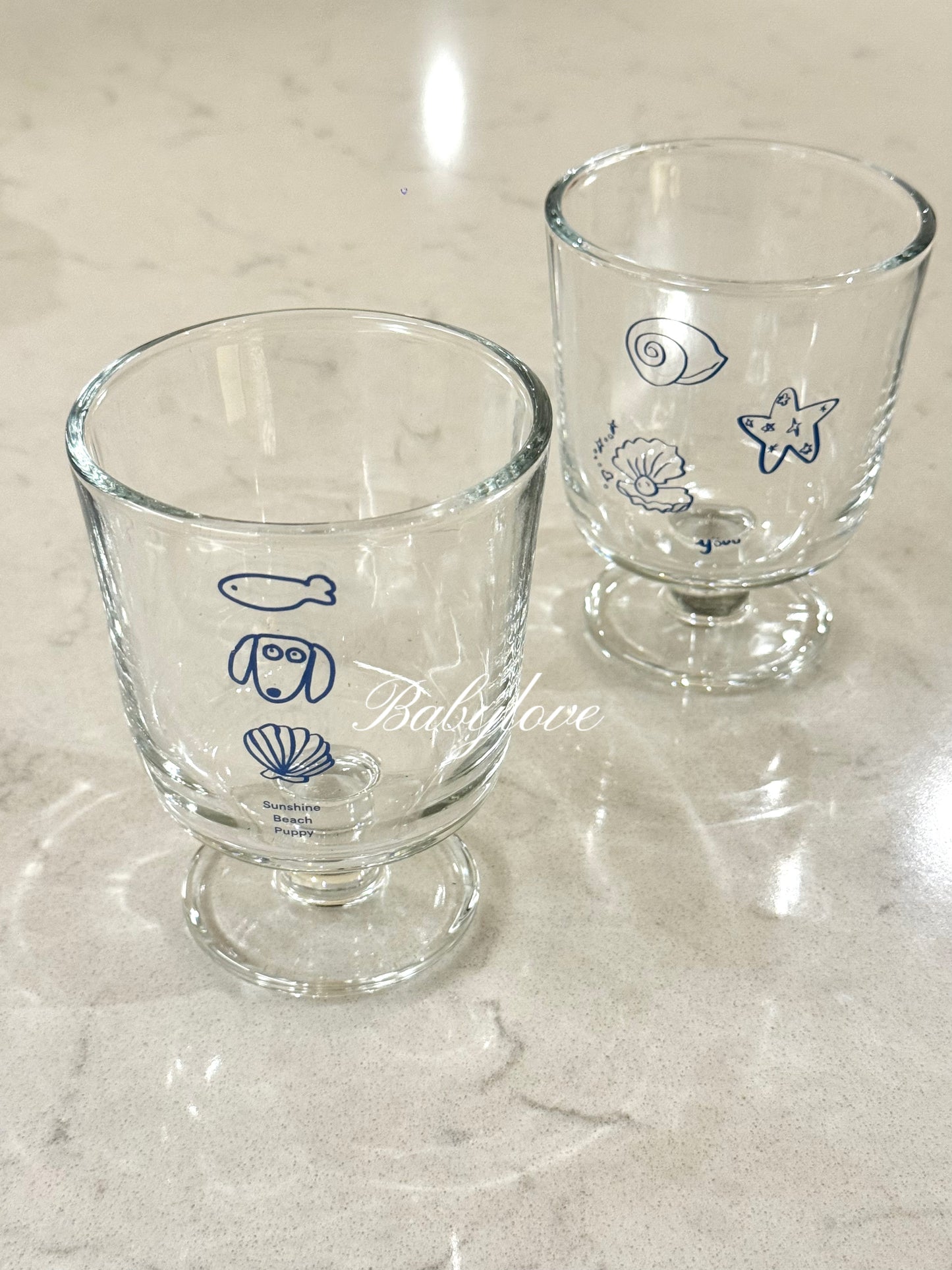 Coastal Charm Glass Cup – With Cute Blue Illustrations