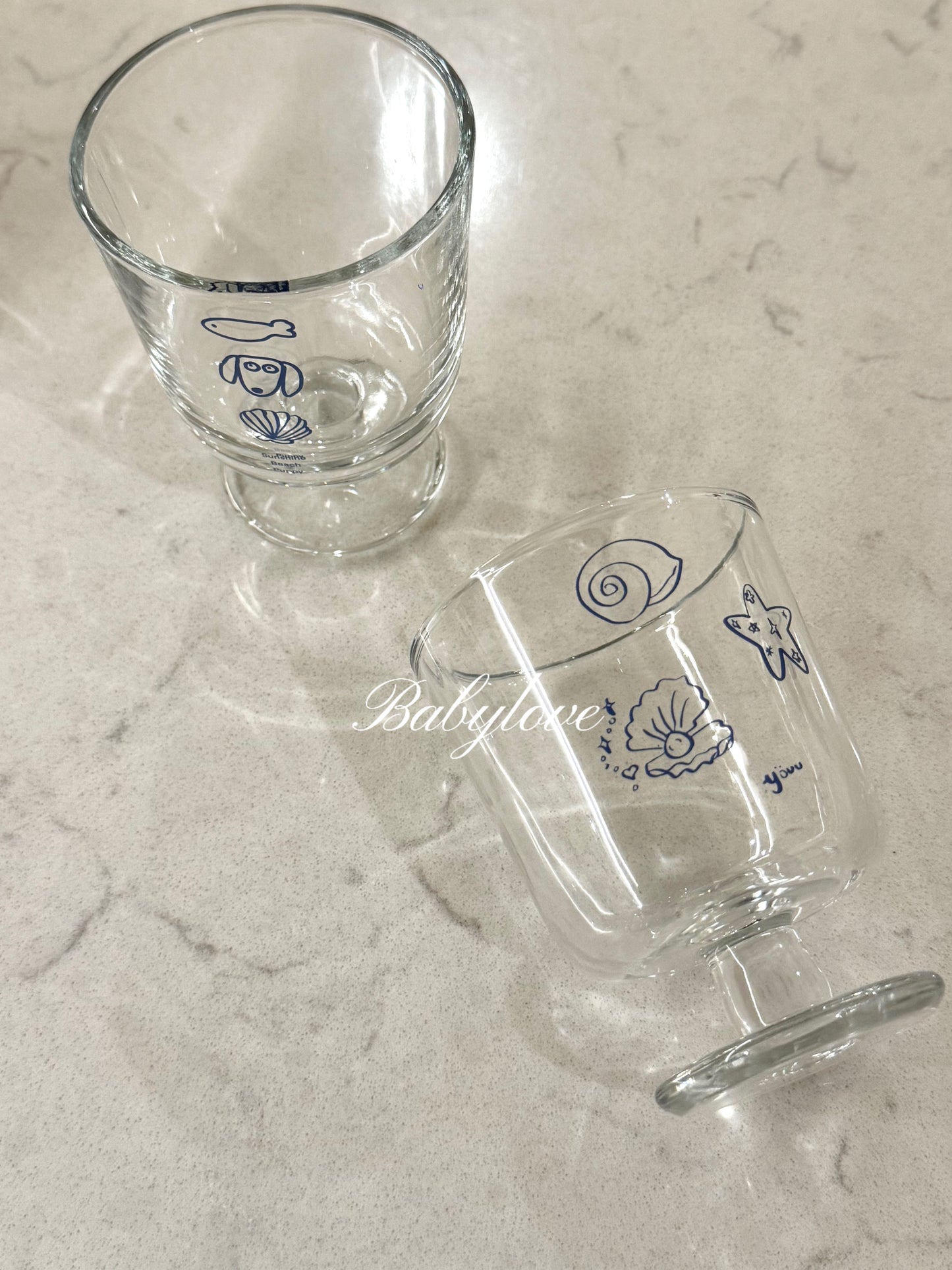 Coastal Charm Glass Cup – With Cute Blue Illustrations