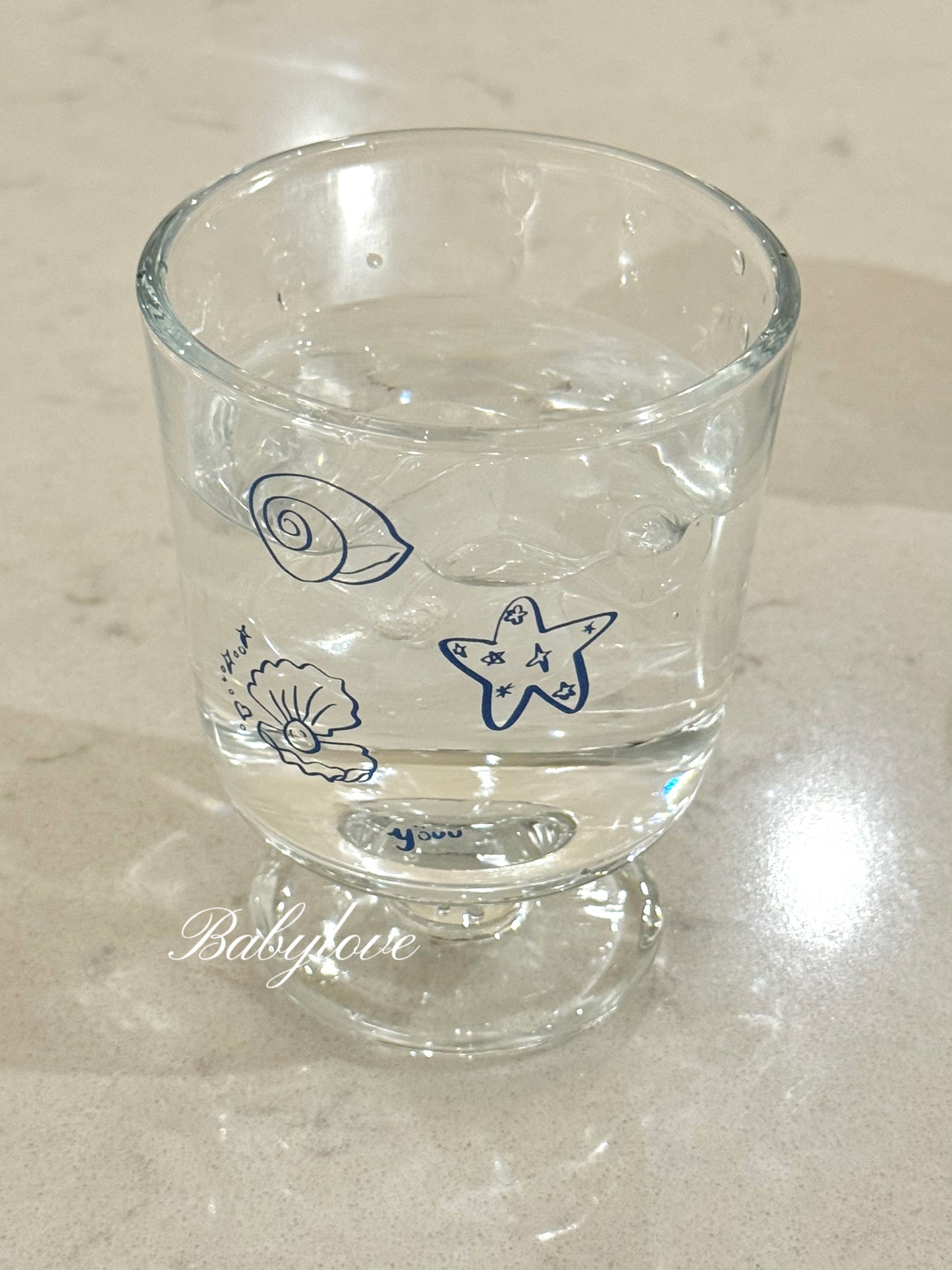 Coastal Charm Glass Cup – With Cute Blue Illustrations